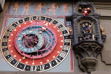 Astronomical clock on the medieval Zytglogge clock tower in Kramgasse street in old city center of Bern, Switzerland.