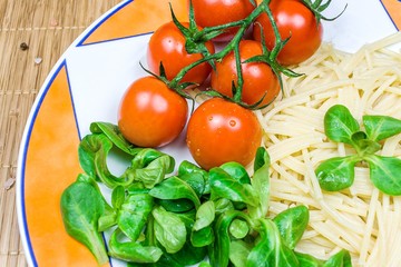 Spaghetti with cherry tomatoes  . 