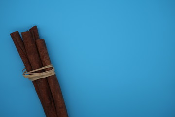 cinnamon on blue background