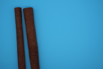 cinnamon on blue background