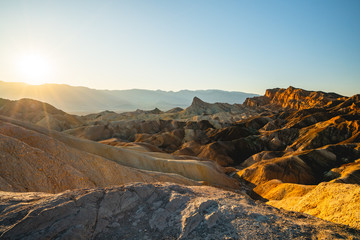 Fototapeta na wymiar Red Canyon, Manly Beacon, sunset. Zabriskie Point Loop in Death Valley National Park, California
