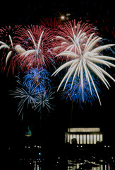 Fireworks light up the sky over the Lincoln Memorial as seen from the Virginia side of the Potomac...