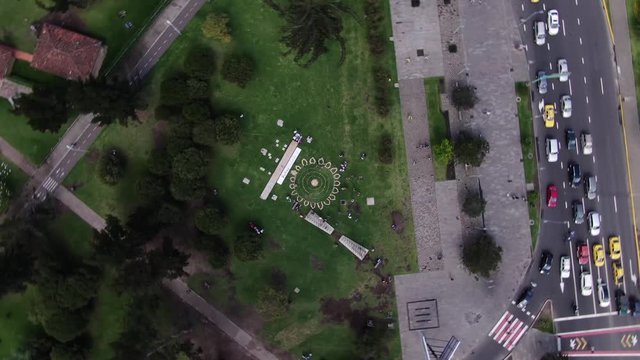 Mandale on the floor made with flowers on park