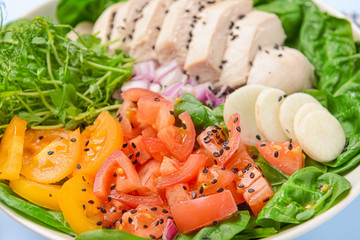 Bowl with tasty salad, closeup