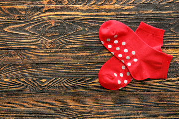 Cotton socks on wooden background