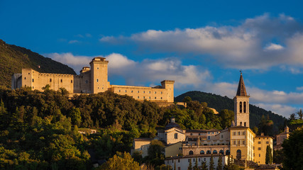Fototapeta na wymiar The ancient city of Spoleto in Umbria, with it most famous medieval landmarks and sunset golden light