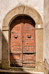Old timber door and arched entrance