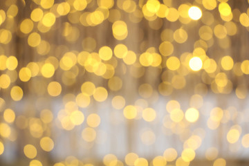 Fototapeta premium Christmas lights background. Abstract blurred colorful lights.