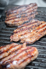 Juicy grilled meat steaks.