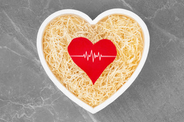 Heart box with red heart inside.