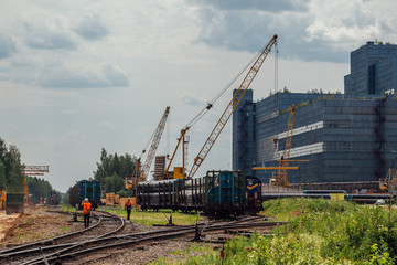 Freight trains with cargo on railroad junction