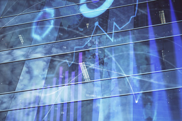 Forex chart on cityscape with tall buildings background multi exposure. Financial research concept.