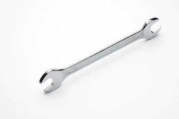 Wrench for nuts and bolts on a white background