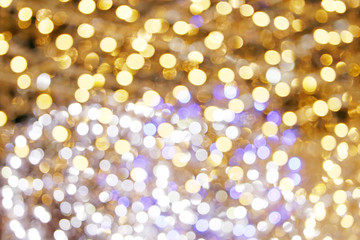 Christmas lights background. Abstract blurred colorful lights.