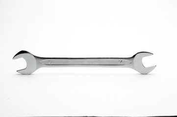 Wrench for nuts and bolts on a white background