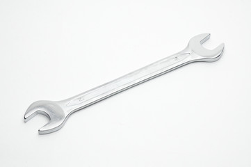 Wrench for nuts and bolts on a white background