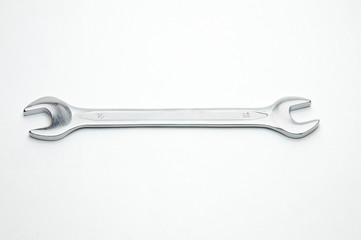 Wrench for nuts and bolts on a white background