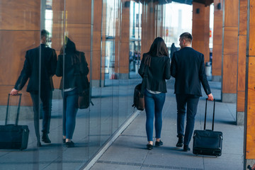 Fototapeta premium Bussiness couple walking through a futuristic modern station