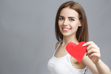 teen girl hold red heart. valentine day