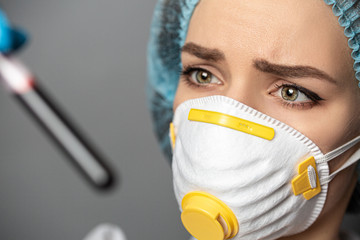 Nurse holding Blood Sample. 