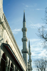 Minaret tower of Sultanahmet camii during a December morning in Istanbul, Turkey. Also called Blue...