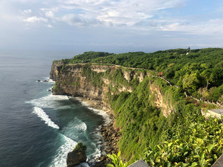 Walking at Uluwatu Temple Cliffside while waiting for Kechak Dance performance.