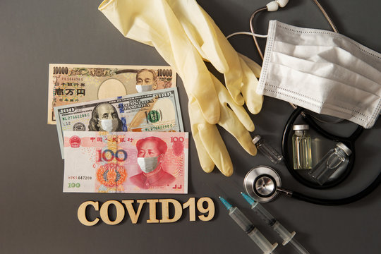 Banknotes with face mask and medical tools 