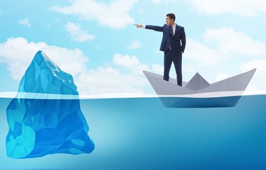 BUsinessman showing directions to avoid problems as iceberg