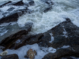 Waves coming to the rocky shore