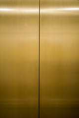 gold metal elevator door