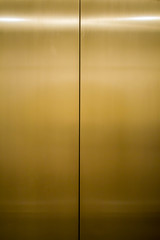 gold metal elevator door