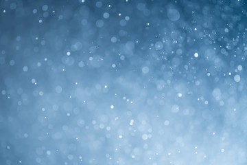 Blue glitter bokeh of light.Abstract blurred light