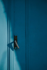 Metal door with vintage handles and rust with space for text