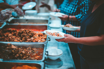 The concept of helping by providing food to the needy in the community.