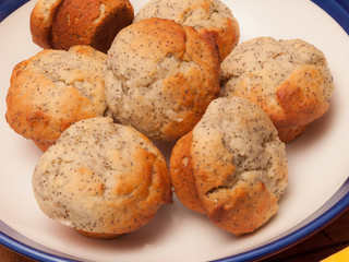 Group of lemon poppy seed muffins on a serving platter