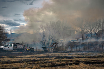 Wildland Fire Engine and ATV at a Brush Incident