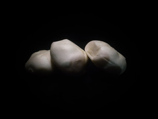  Chocolate bun isolated on black background