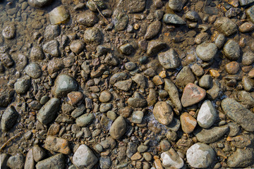 Pebble stone background. Sea Pebble. Beach stones. Natural background. Stone texture