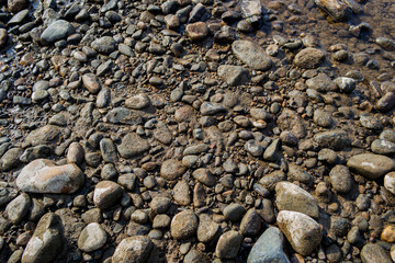 Pebble stone background. Sea Pebble. Beach stones. Natural background. Stone texture