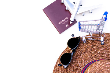 Mock up trip accessories, passport and plane model isolated on white background. Summer and holiday travel concept.