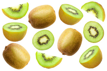 Fresh organic ripe whole kiwi fruits and slices isolated on white background. Top view. Flat lay.
