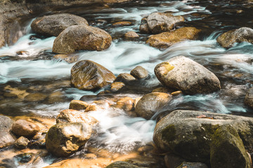 water flowing over rocks