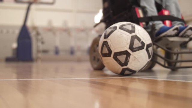 motorized wheelchair paralympic power soccer players playing