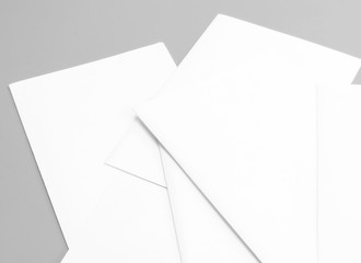 Blank portrait A4. Mock-ups sheets white paper isolated on gray background. can use banners magazine products business texture newspaper.