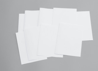 Blank portrait A4. Mock-ups sheets white paper isolated on gray background. can use banners magazine products business texture newspaper.