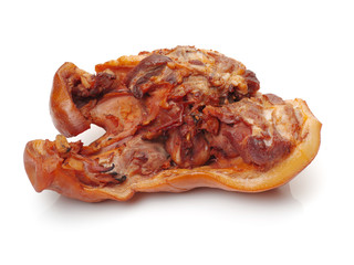 cooked the face of the pig on white background