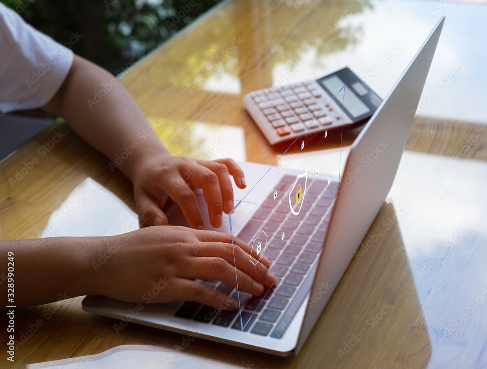 Poster person using a laptop computer with technology cybersecurity and privacy concept. protection and saf