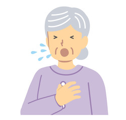 紫の服を着たくしゃみするシニア女性