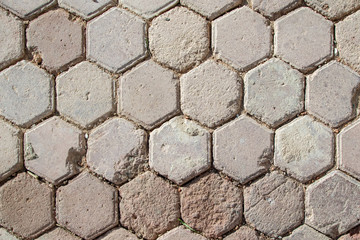Paving stones. Old road wall background.