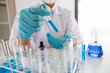 Medical scientists have experimented with liquid chemicals in vitro to analyze viral data in chemical laboratories. Scientific research concepts